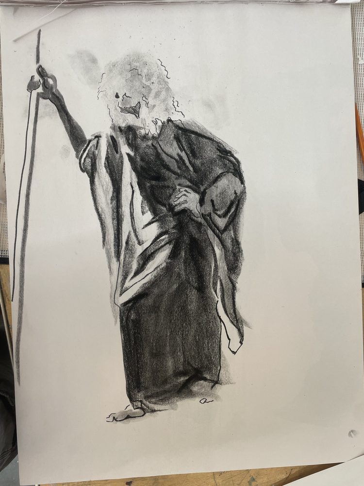 Figure with Staff